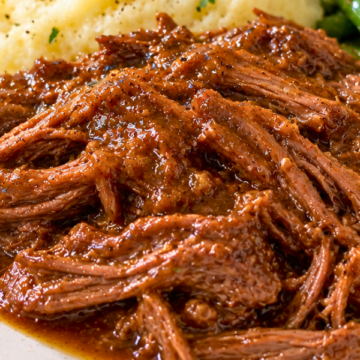 Slow Cooker Apple Ginger Beef is one of those easy dinners that's perfect for busy weeknights! Tender chuck roast cooks low and slow in a sweet and savory sauce made with apple juice, fresh ginger, honey, garlic, and soy sauce